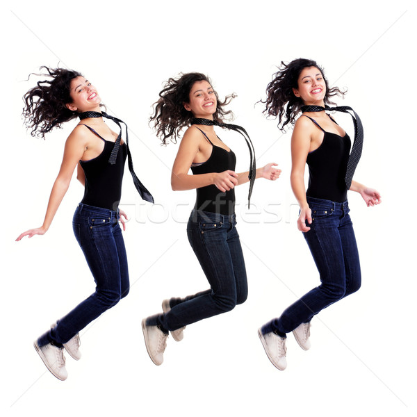 Atrakcyjny młoda dziewczyna skoki odizolowany biały szczęśliwy Zdjęcia stock © kokimk