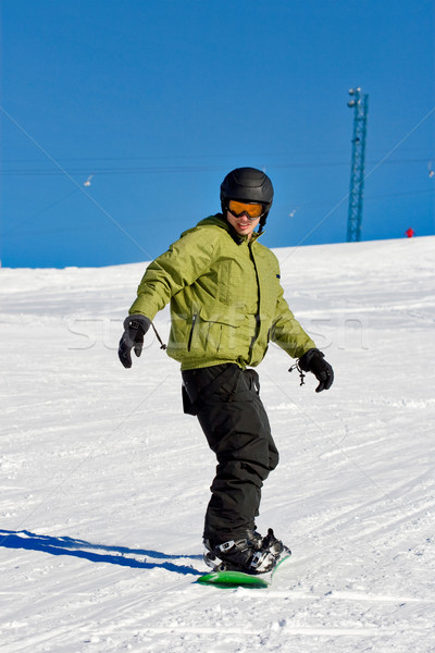 Snowbordos portré fiú snowboard férfi sport Stock fotó © kokimk