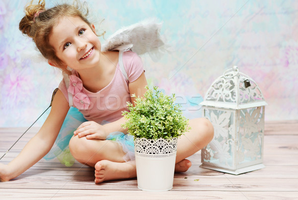 Little witch with charming smile Stock photo © konradbak