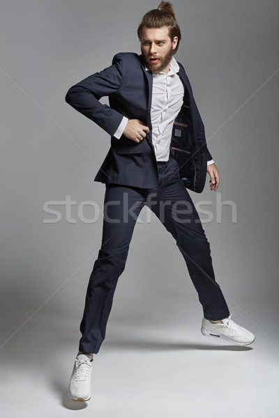 Portrait of a handsome guy wearing suit Stock photo © konradbak