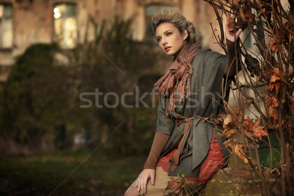 Autumn scenery and blond beauty Stock photo © konradbak