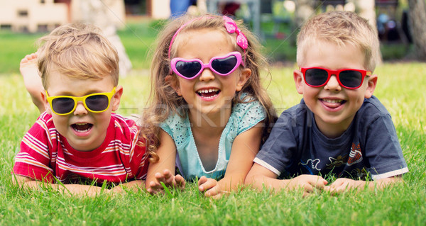 Stock photo: Funny picture of three playing kids