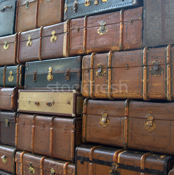 Conceptual picture of the wal of suitcases Stock photo © konradbak