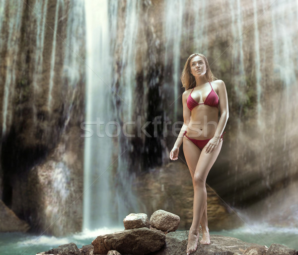 Sensueel blonde vrouw poseren waterval tropische vrouw Stockfoto © konradbak