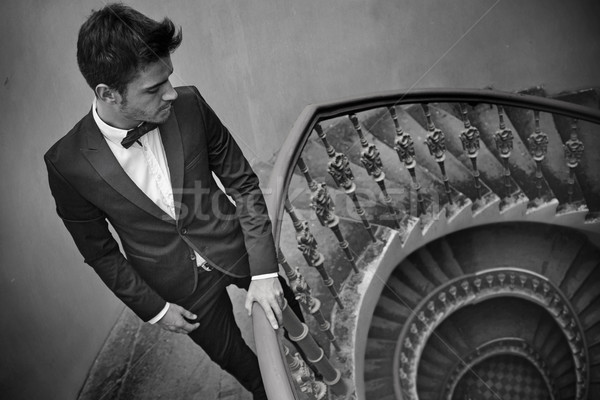 Handsome man in the tenement house Stock photo © konradbak