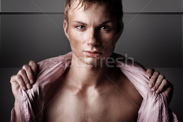 Young man looking towards camera Stock photo © konradbak