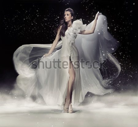 Gyönyörű barna hajú hölgy fehér ruha háttér szépség Stock fotó © konradbak