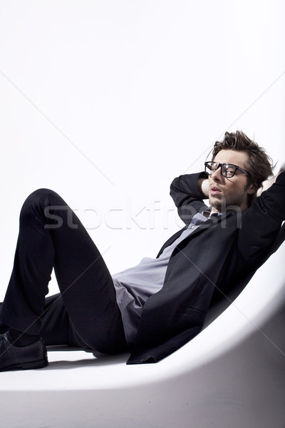 Very attractive young man relaxing in his place Stock photo © konradbak