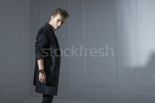 Young stylish man wearing a modern jacket Stock photo © konradbak