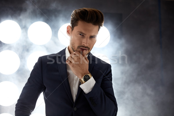 Portrait of a handsome, young man in the night club Stock photo © konradbak