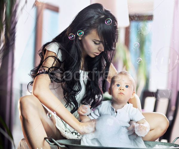 Young beauty mother and her child Stock photo © konradbak