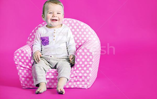 Little cute boy in the pink room Stock photo © konradbak