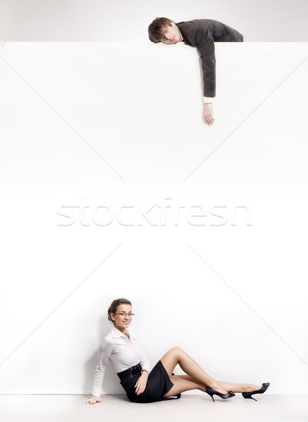 Businesspeople over an empty white board Stock photo © konradbak