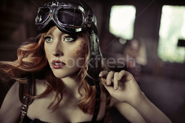Portrait of the fabulous airwoman Stock photo © konradbak