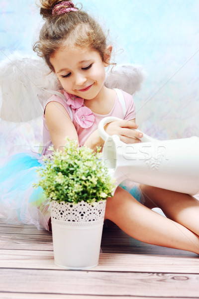 Stock photo: Little girl with fancy wings