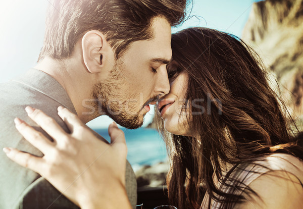 Portrait of a kissing couple Stock photo © konradbak