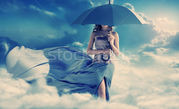 Bastante senhora caminhada paraíso mulher bonita nuvens Foto stock © konradbak