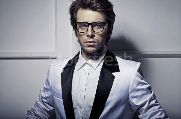 James Bond's style of young model Stock photo © konradbak