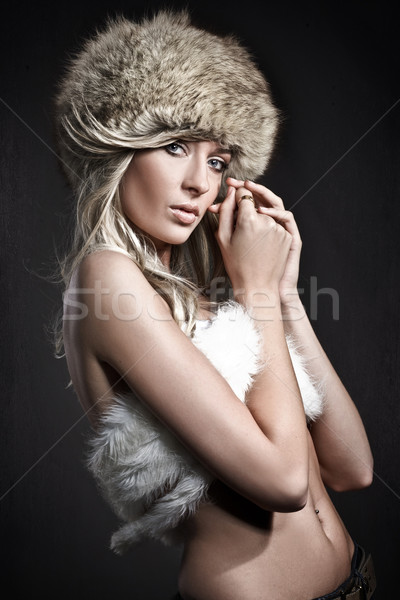 Fashion style photo of a young blonde Stock photo © konradbak