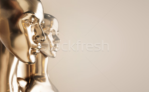 Two pieces of human golden scupltures Stock photo © konradbak