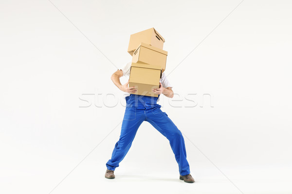 Hard-working builder with bunch of boxes Stock photo © konradbak