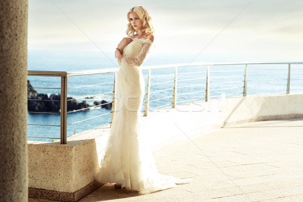 Calm blond bride waiting for her husband Stock photo © konradbak