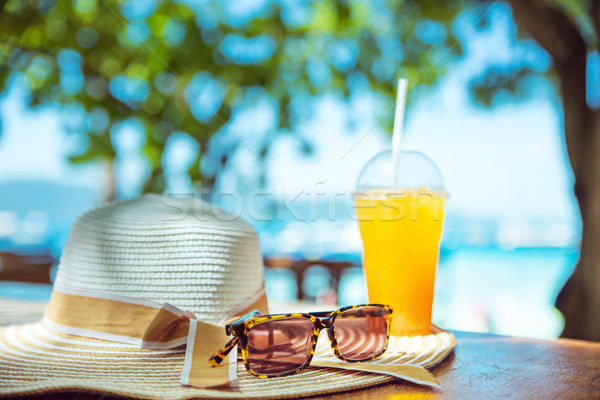 Summer accessories, tropical beach, cold drink  Stock photo © konradbak