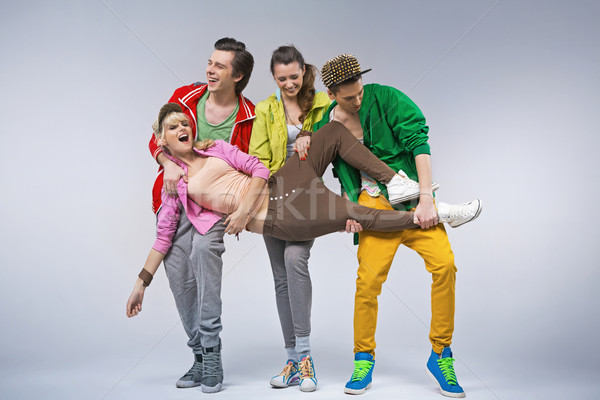 Hip-hop teenagers making funny poses Stock photo © konradbak