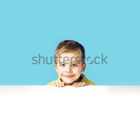 Little man playing hide and seek Stock photo © konradbak