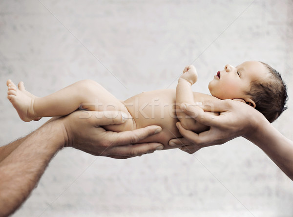 Stock photo: Newborn baby sleeping on parents hand