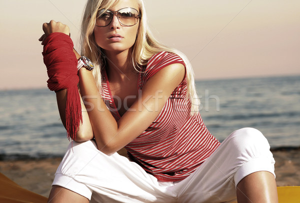 Vacation day of a cute blonde Stock photo © konradbak