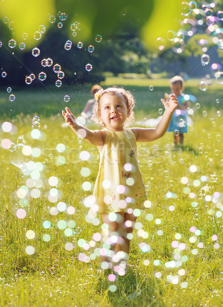 Portrait deux jouer ensemble bulles de savon [[stock_photo]] © konradbak