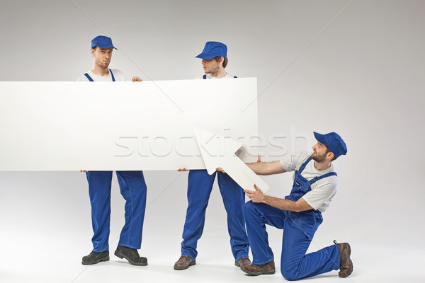 Portrait of the three employees Stock photo © konradbak