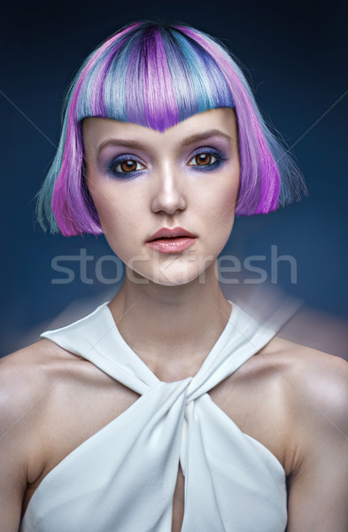 Portrait of a young lady with a colorful coiffure Stock photo © konradbak