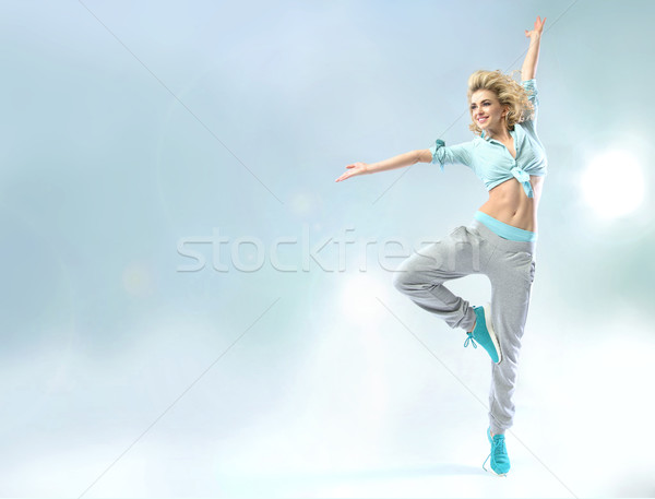 Shapely dancer practicing trhe choreography Stock photo © konradbak