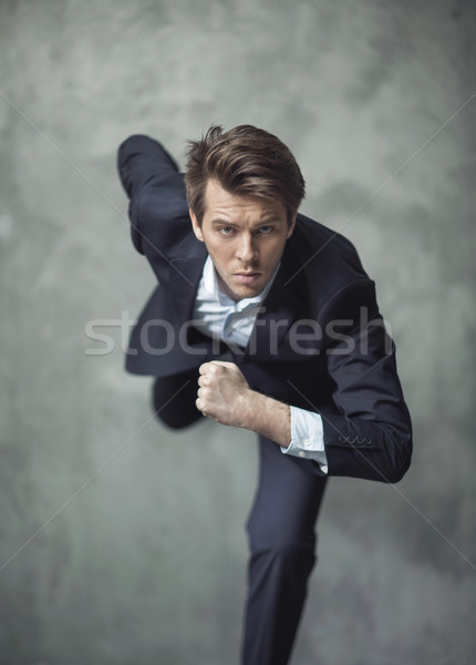 Conceptual photo of handsome businessman starting his career Stock photo © konradbak