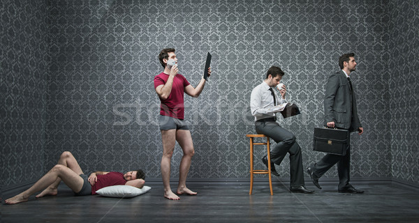 Young office worker is getting ready for work Stock photo © konradbak