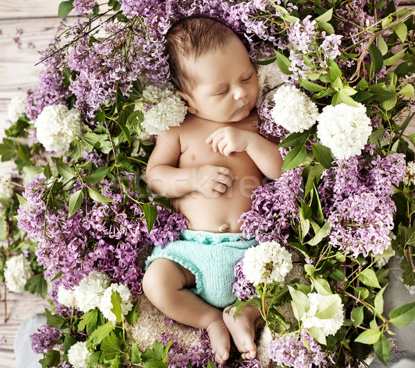 Cute ребенка спальный ребенка цветок девушки Сток-фото © konradbak