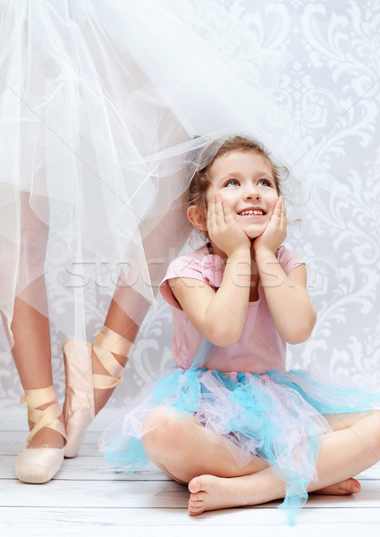 Cute kid next to the ballet dancer sister Stock photo © konradbak