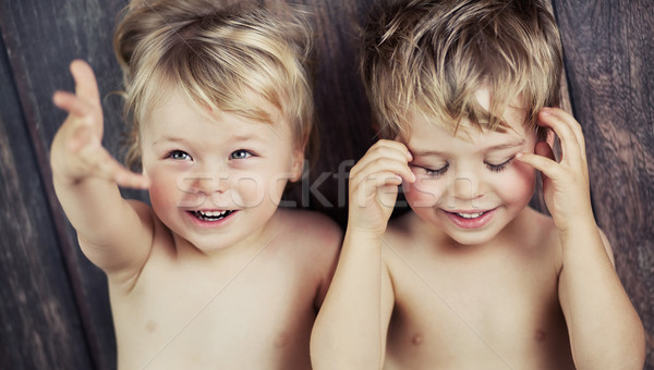 Two little boys smiling at the camera Stock photo © konradbak