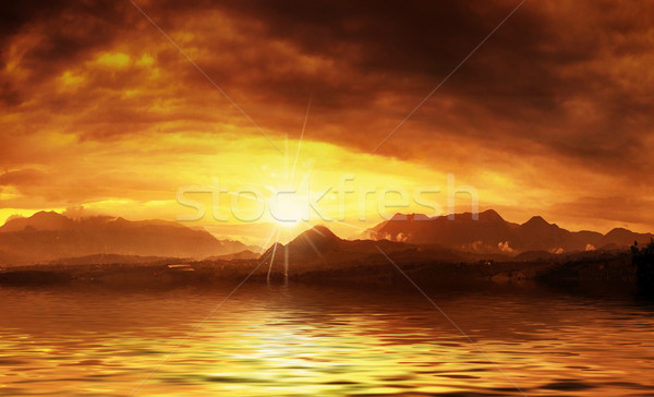 Hot sunset over water surface Stock photo © konradbak