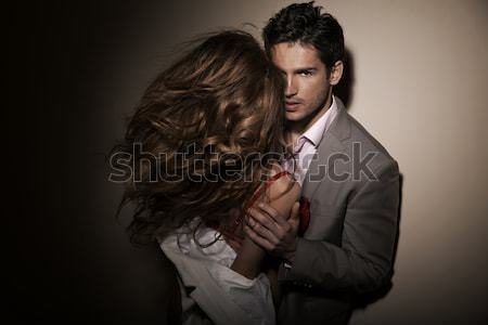 Portrait of cute couple posing Stock photo © konradbak