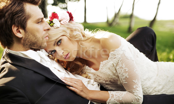 Recién casados Pareja relajante lago cielo Foto stock © konradbak