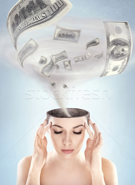 Dollars tornado in woman's head Stock photo © konradbak