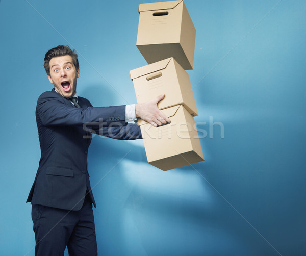 Surprised smart banker with the boxes Stock photo © konradbak