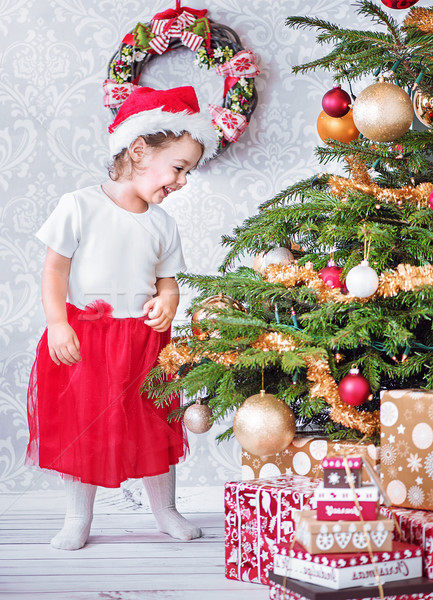 Portrait satisfait petite fille arbre de noël peu fille [[stock_photo]] © konradbak