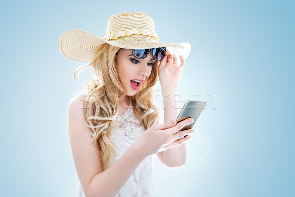 Portrait élégante jeunes dame smartphone téléphone portable Photo stock © konradbak