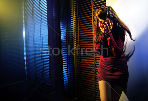 Portrait of a crying woman Stock photo © konradbak