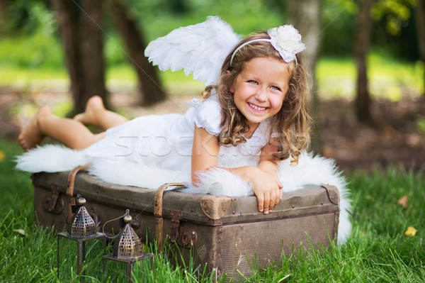 Mały cute anioł walizkę niebo Zdjęcia stock © konradbak