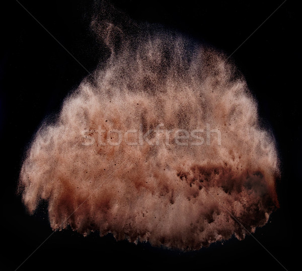 Brown powder  tornado over dark background Stock photo © konradbak
